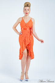 Woman wearing a orange lace one-size dress, summer party dress