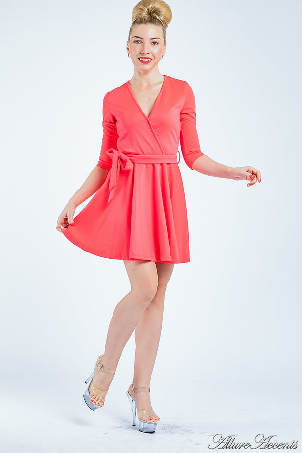 Women is wearing a coral mini swing dress, casual mid-sleeves all season appropriate dress