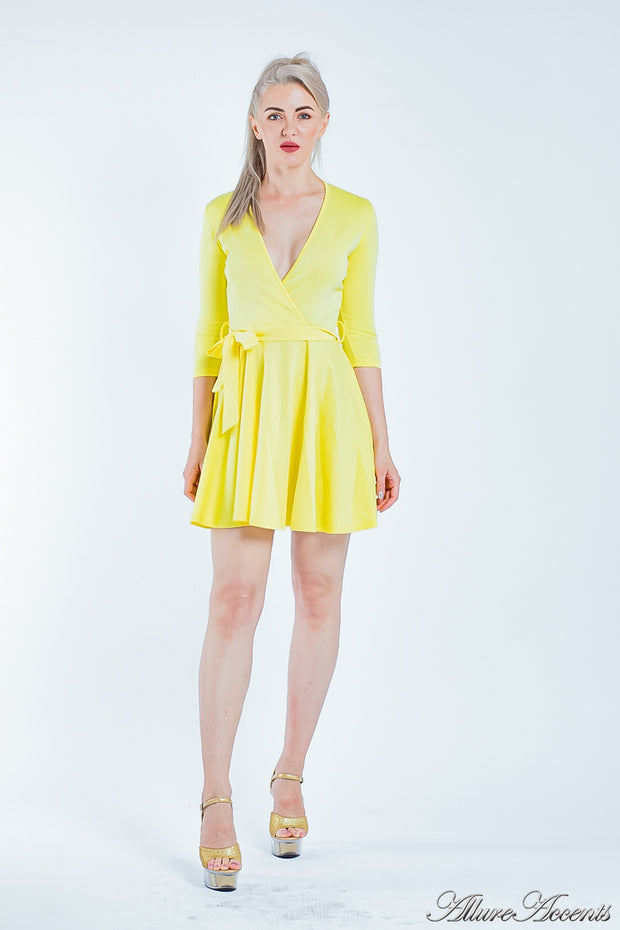 Women is wearing a yellow mini swing dress, casual mid-sleeves all season appropriate dress