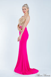 Woman wearing a sequined long hot pink colored gown.