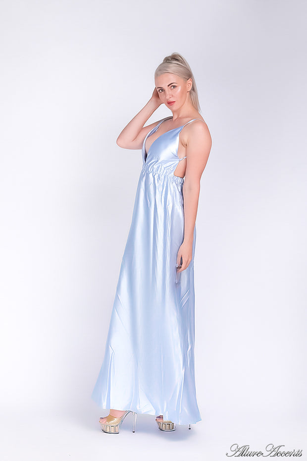 Woman wearing an icy blue colored long satin dress that has a deep v neckline.