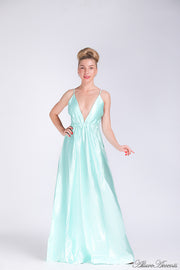 Woman wearing a tiffany blue colored long satin dress that has a deep v neckline.