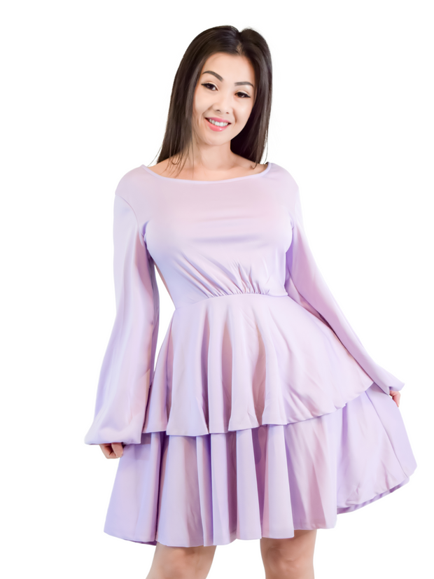 Woman is wearing a lavender mini layers dress, casual long sleeves dress appropriate for all seasons 
