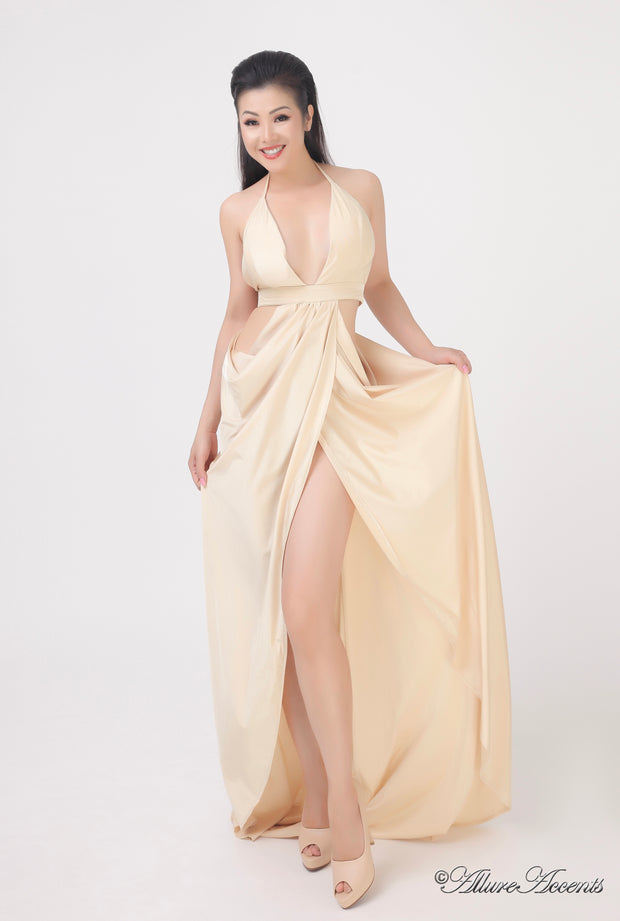 A woman wearing a sexy beige party long maxi dress