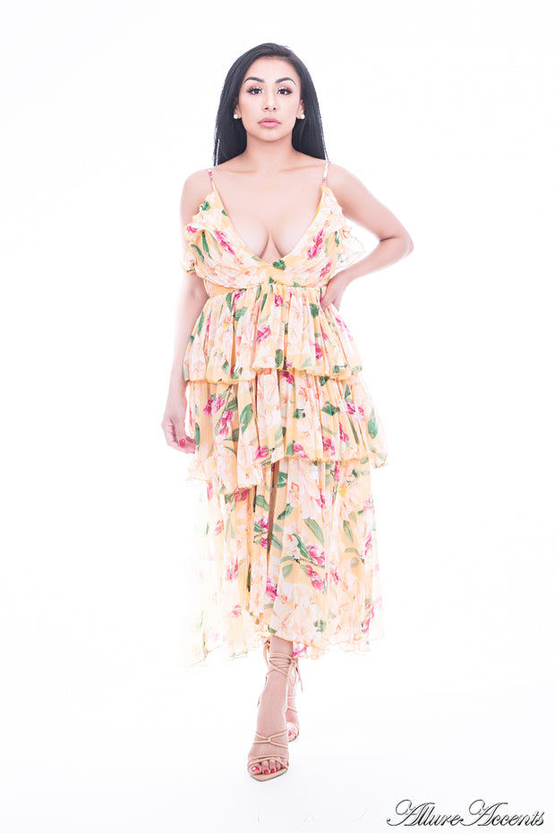 Women is wearing yellow multi color floral dress, one-size fits all 3 layers pleated chiffon midi sundress with sexy low-cut back 