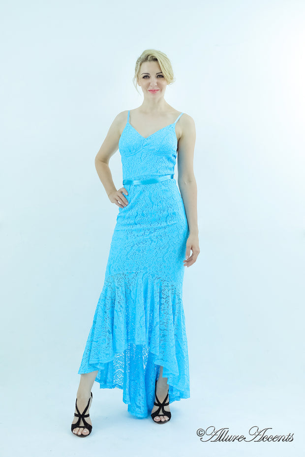 Woman wearing a baby blue colored high-low floral lace dress.