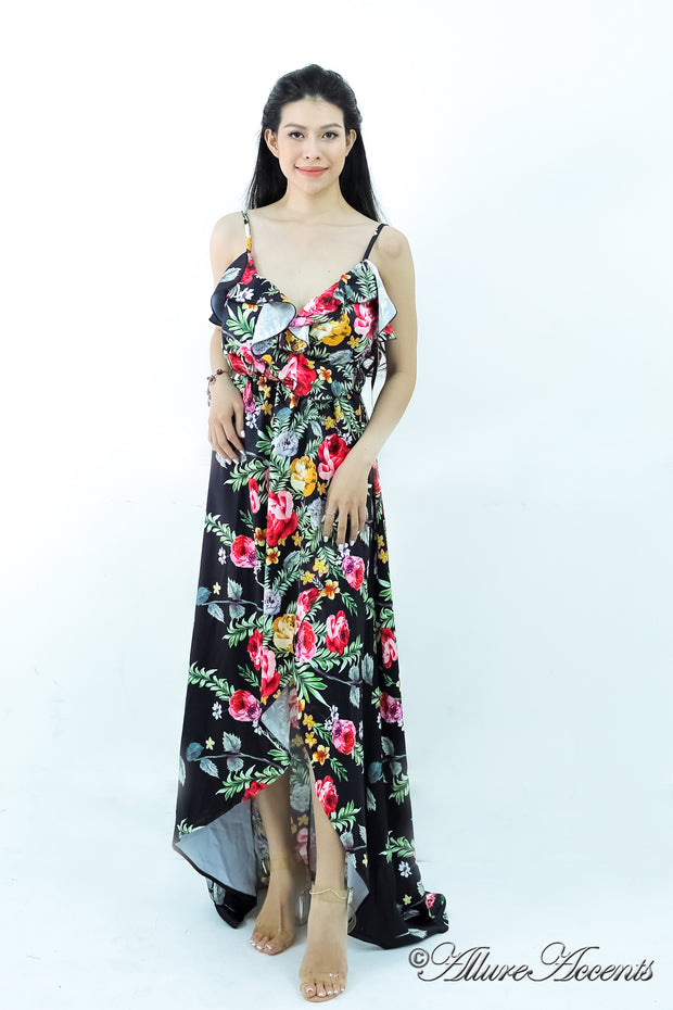 Women is wearing a black multi color floral maxi dress, sexy satin floral sundress with low-cut back with ruffles detail 
