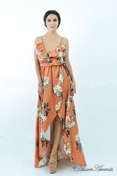 Women is wearing a brown multi color floral maxi dress, sexy satin floral sundress with low-cut back with ruffles detail 