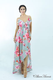 Women is wearing a grey multi color floral maxi dress, sexy satin floral sundress with low-cut back with ruffles detail 