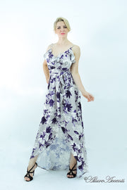 Women is wearing a grey multi color floral maxi dress, sexy satin floral sundress with low-cut back with ruffles detail  