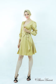 woman wearing a one-size fits all beige satin wrap dress