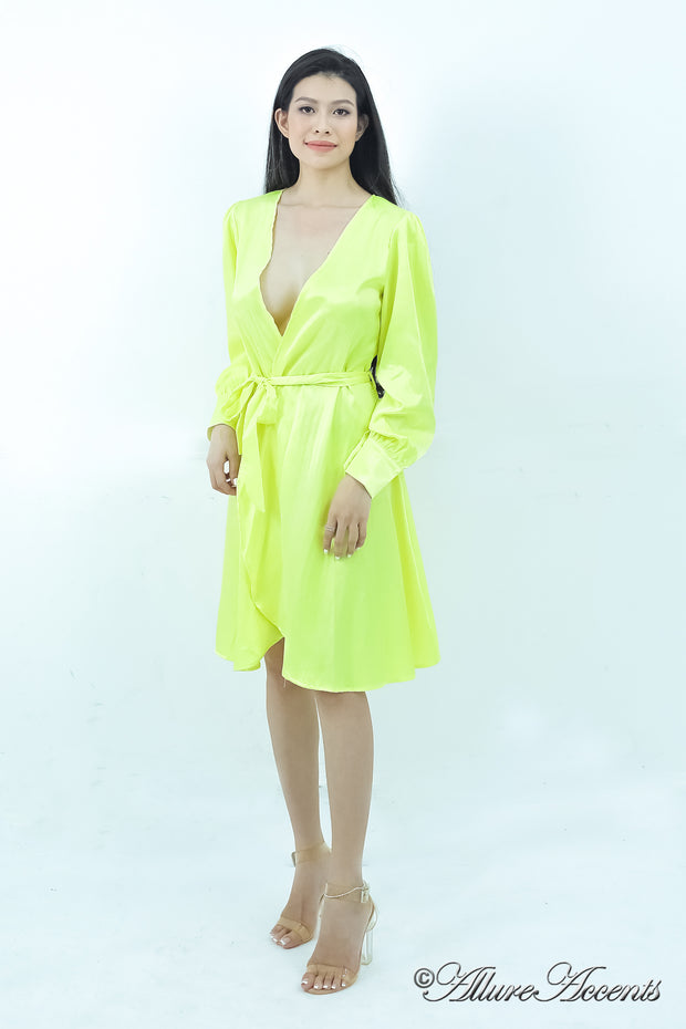 woman wearing a one-size fits all yellow satin wrap dress