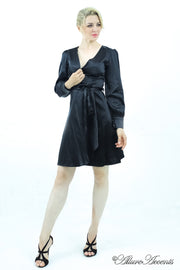 woman wearing a one-size fits all black satin wrap dress