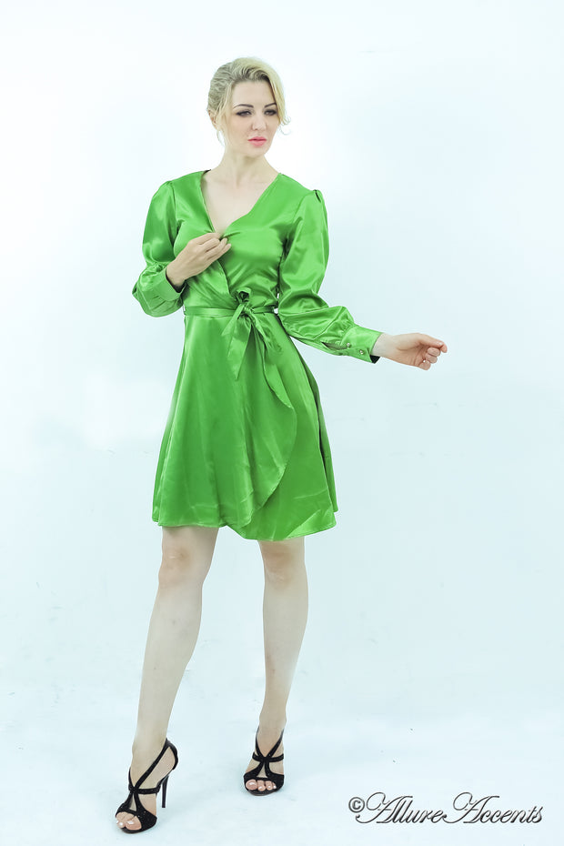 woman wearing a one-size fits all green satin wrap dress