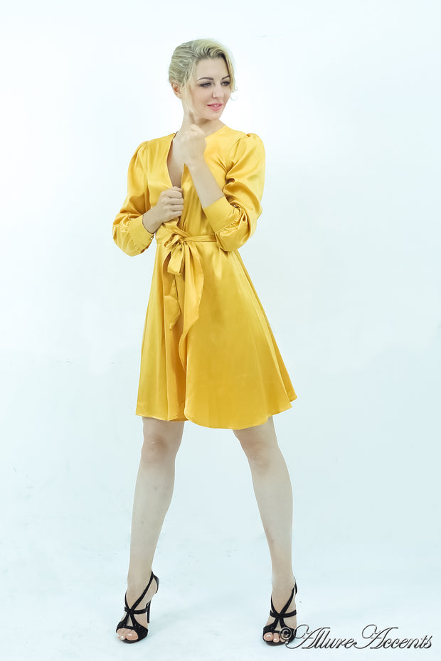 woman wearing a one-size fits all gold satin wrap dress