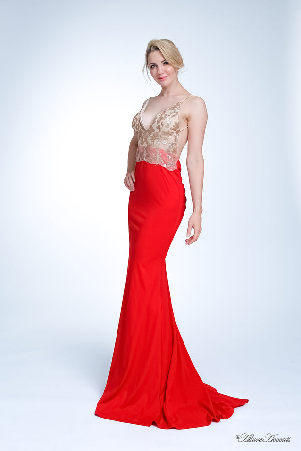 Woman wearing a sequined long red colored gown.