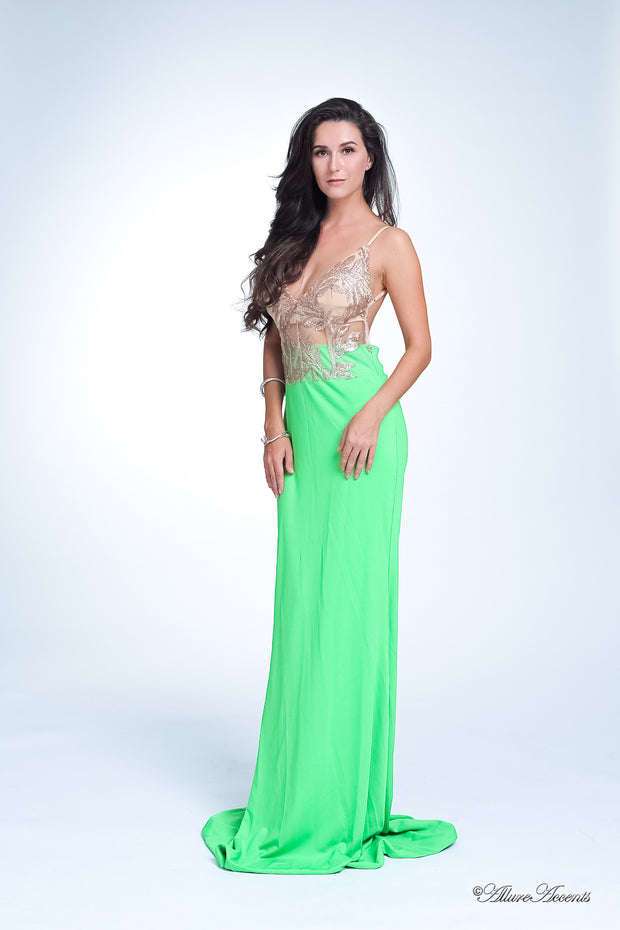 Woman wearing a sequined long lime green  colored gown.