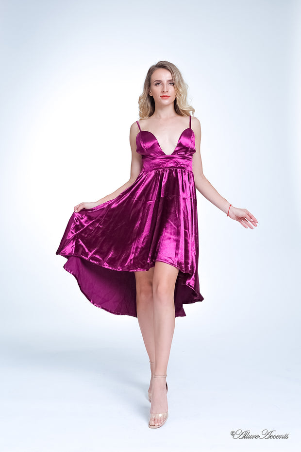 Woman wearing summer cherry color satin party dress, hi-low style with chest paddings