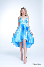 Woman wearing summer turquoise satin party dress, hi-low style with chest paddings