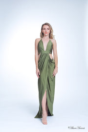 A woman wearing a sexy olive party long maxi dress