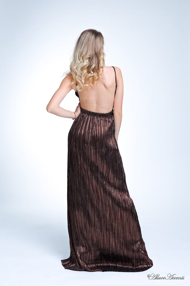 Woman wearing a dark brown, coffee long maxi length slip dress showing it has a low back cut.