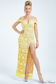 Woman wearing a yellow sweetheart neckline lace dress. 