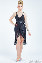 Woman wearing a black lace one-size dress, summer party dress