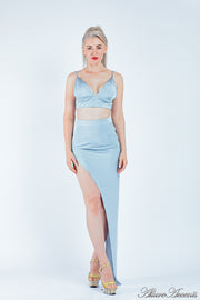 Woman wearing a grey 2 pieces set, summer crop top and sexy side slit long skirt