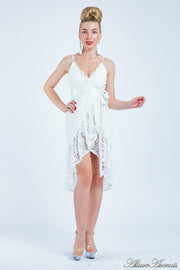 Woman wearing a white lace one-size dress, summer party dress