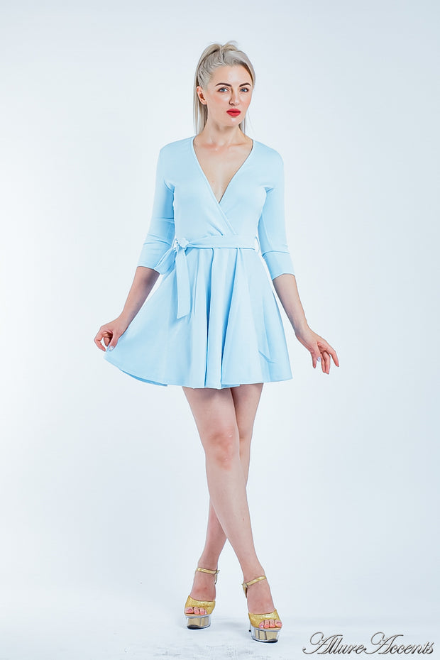 Women is wearing a baby blue mini swing dress, casual mid-sleeves all season appropriate dress