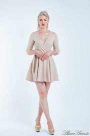 Women is wearing a beige mini swing dress, casual mid-sleeves all season appropriate dress