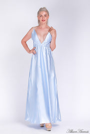 Woman wearing an icy blue long satin dress that has a deep v neckline.