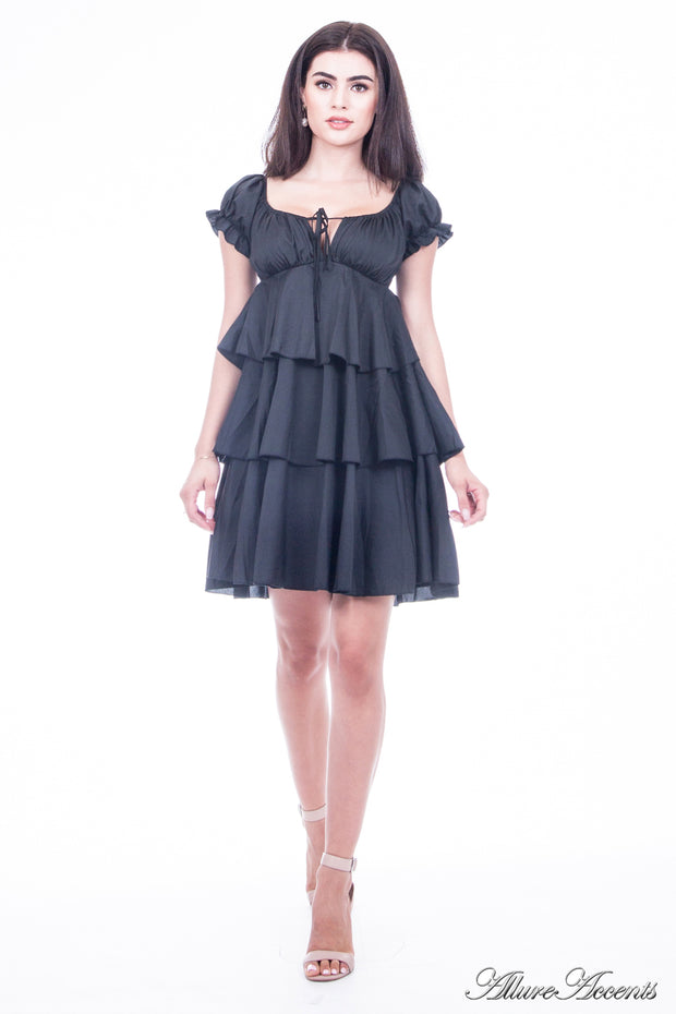 Women is wearing black layers summer dress, casual mini sweetheart neck dress