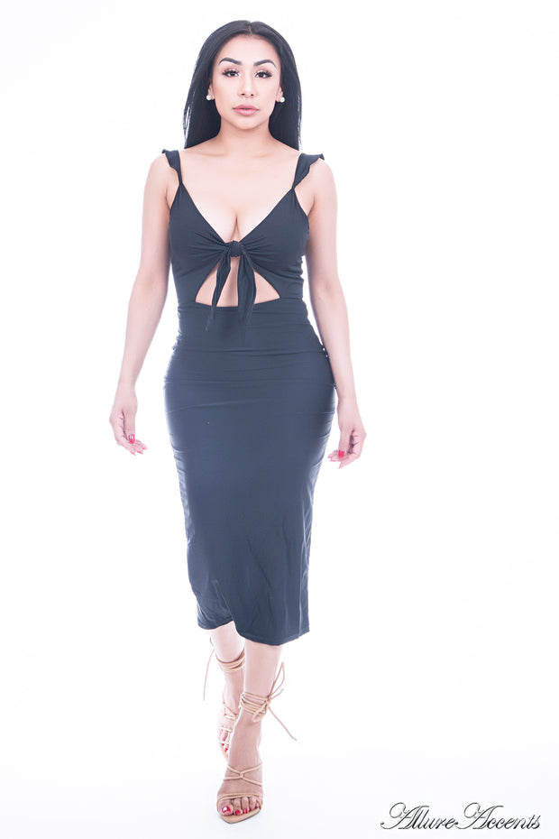 Women is wearing a black bodycon dress, sleeveless party summer dress
