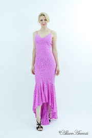 Woman wearing a lavender high-low floral lace dress.