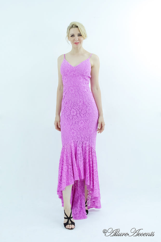 Woman wearing a lavender high-low floral lace dress.