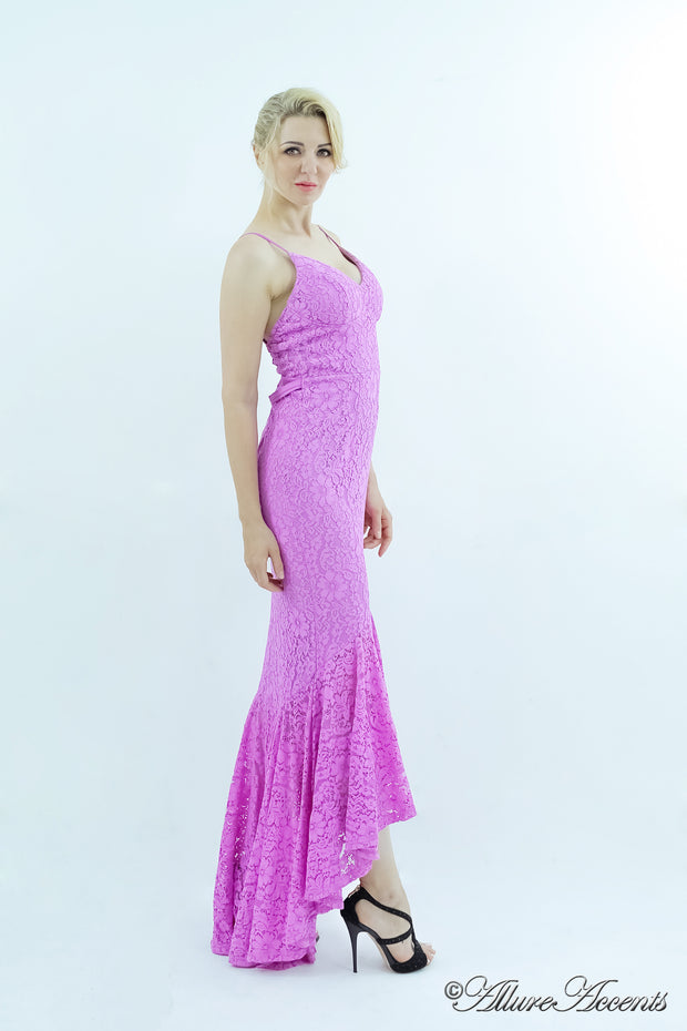 Woman wearing a lavender high-low floral lace dress.
