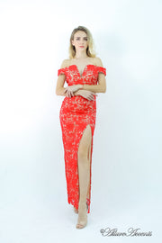 Woman wearing a red off-the-shoulder lace dress.