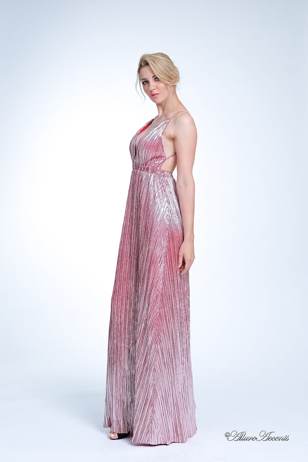 Woman wearing a cherry red colored maxi length slip dress with a deep v neck.